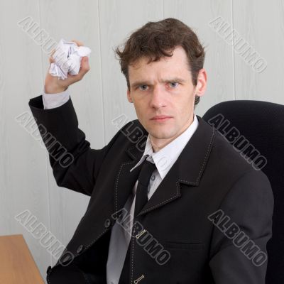 Director throwing crumpled paper