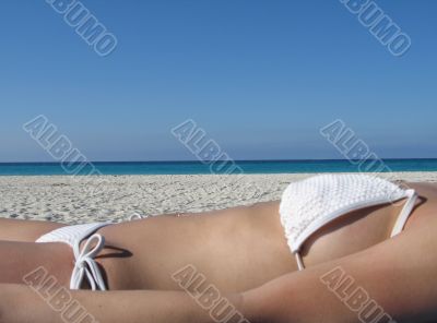 female in a white bikini