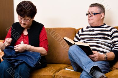 Elderly couple on the couch