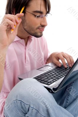 young man working on laptop