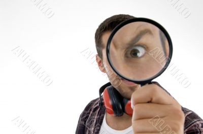 man magnifing his eye