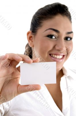 young female showing business card