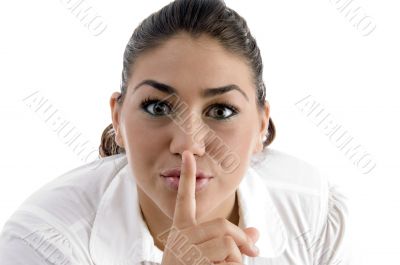 woman instructing to be silent