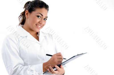smiling doctor with writing board