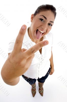 standing woman showing peace sign