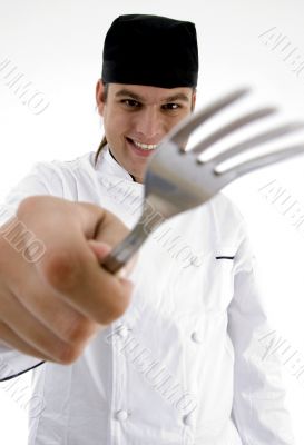 close up view of fork holding chef