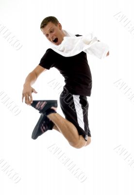 jumping man looking his shoes