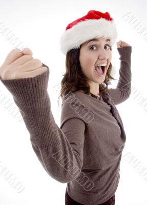 successful teenager wearing christmas hat