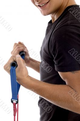 man holding exercising rope