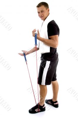 exercising man holding rope