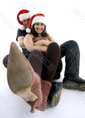 posing couple with long legs in front of camera