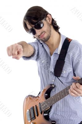 young guitarist with pointing finger