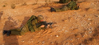 Israeli soldiers excersice in a desert