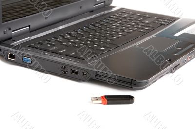 Laptop and flash drive.