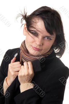 wind. young woman in topcoat