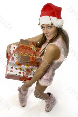 beautiful girl with the gifts to Christmas