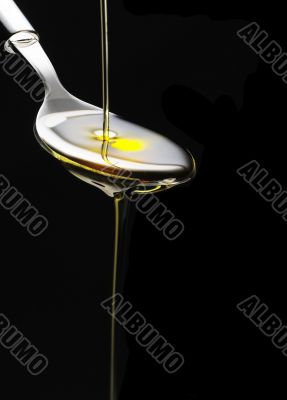olive oil on a spoon