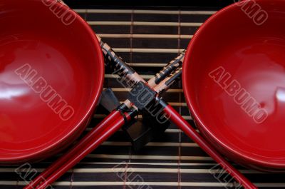 chopsticks and two dishes