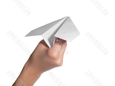 The female hand starts the paper plane