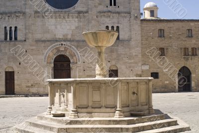 Bevagna - Church and fountain in Silvestri Square