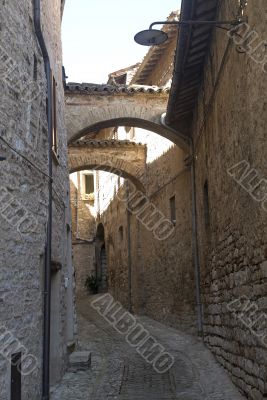 Spello - Old typical alley with arches