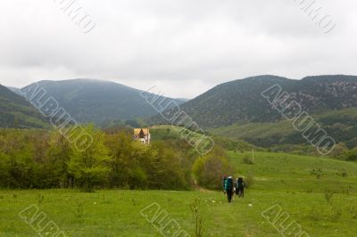 Lonely dwelling in green mountains