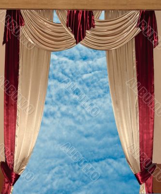 Sky and window curtain.