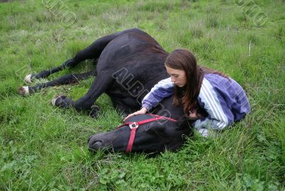 horse laid down and teen
