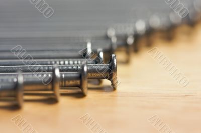 Macro of Nails on Wood