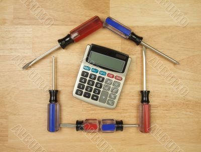 House Shaped by Screwdrivers and Calculator