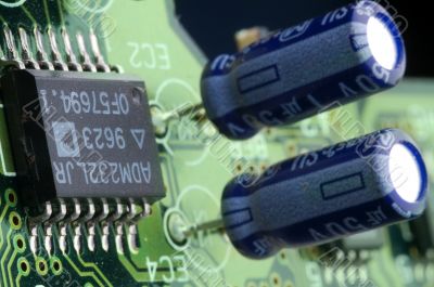 close-up chip on green motherboard