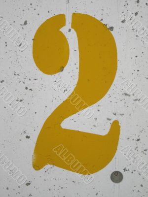 yellow painted number 2