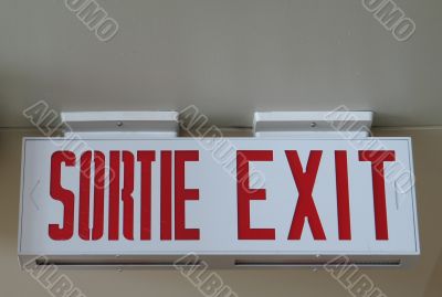 bilingual exit sign