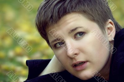 Young amused woman with a bob haircut