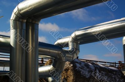 Industrial zone, Steel pipe-lines on blue sky