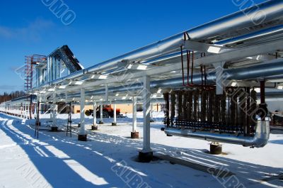 Industrial zone, Steel pipe-lines on blue sky