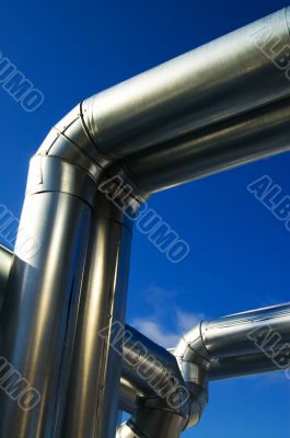 Industrial zone, Steel pipe-lines on blue sky