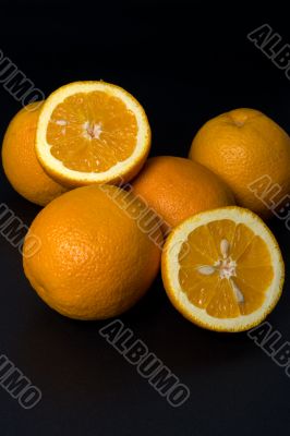 Six orange fruits