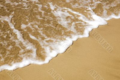 Sand and sea foam