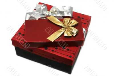 Dark red gift box with  ribbon isolated on the white