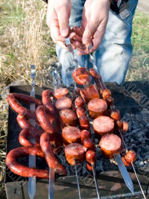 Sausages on charcoal