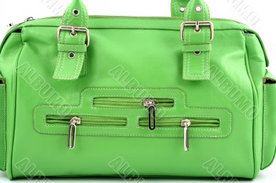 Zippers on a green bag