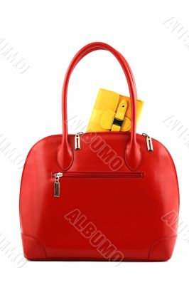 Yellow pocket in a red handbag