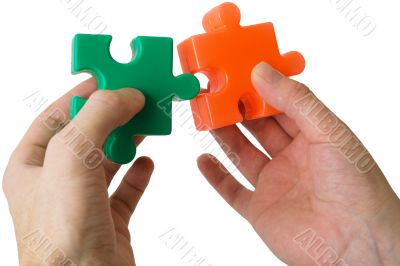 Hand and puzzle