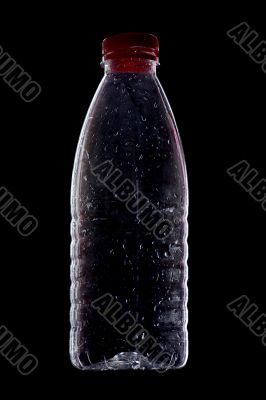 plastic bottle on black