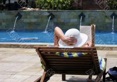Woman reading in a chair