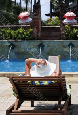 Woman reading in a chair