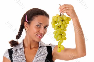 beautiful girl with green grapes