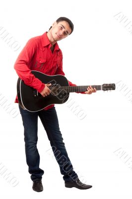 Guitarist. The man in a red shirt.