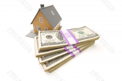 Home and Stacks of Money Isolated